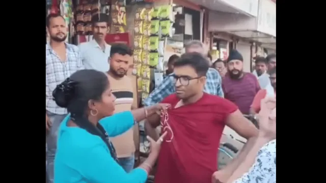 wife-beats-husband-in-public-holds-collar-and-asks-passersby-to-take-video-internet-reacts